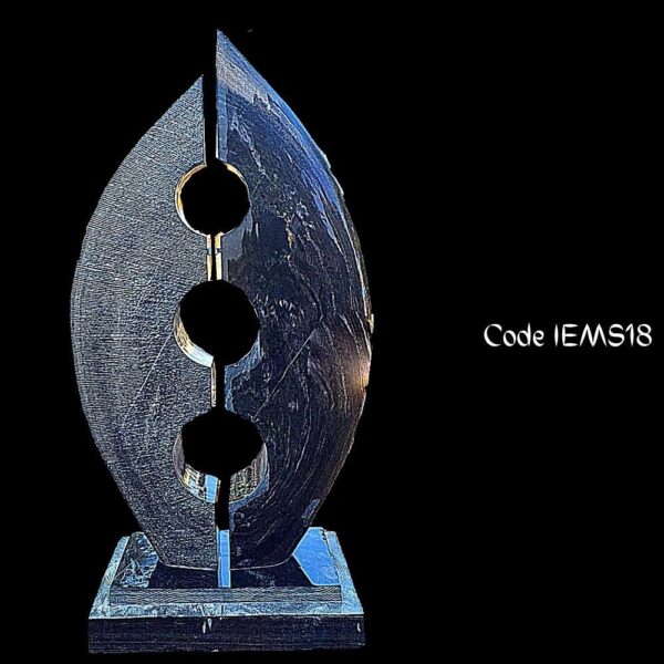 Contemporary marble sculpture of flame is in Black Marble