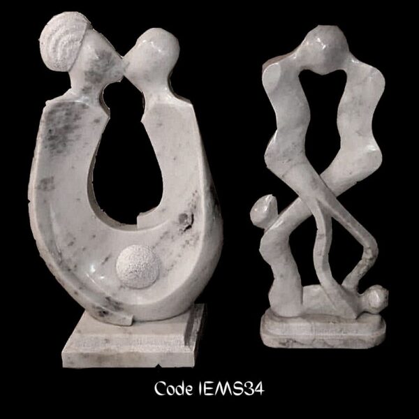 modern abstract sculpture is of a couple in romance in Banswara white Marble