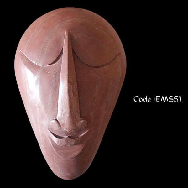 contemporary marble sculpture of a Mask has been made from Pink Marble