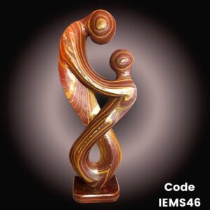 modern abstract sculpture is of a couple in romance in Teak Brown Marble
