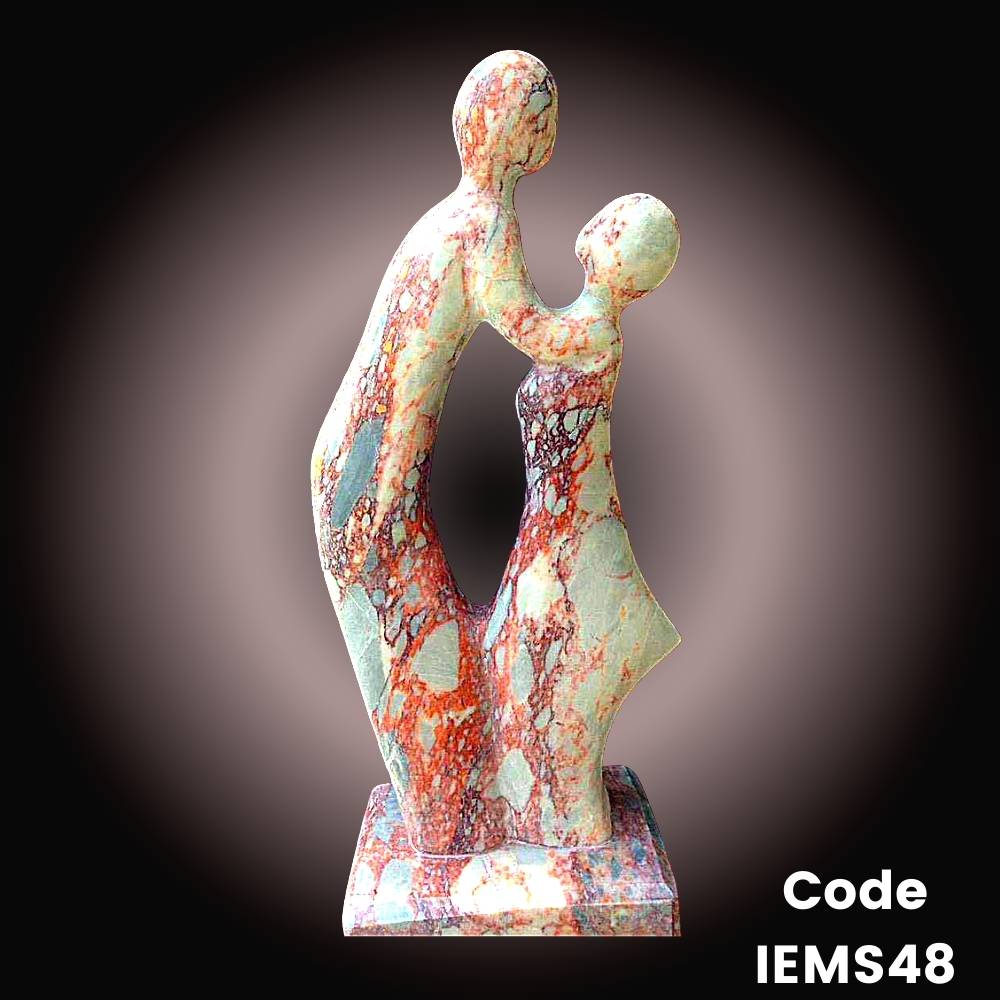 Modern abstract marble sculpture of a couple in romance is in onyx Marble