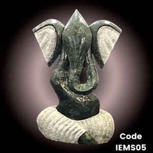 Modern marble statue of Ganesha in meditation in green marble