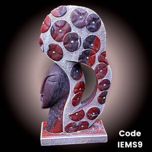 Contemporary marble sculpture of face of African lady with head gear in Pink marble